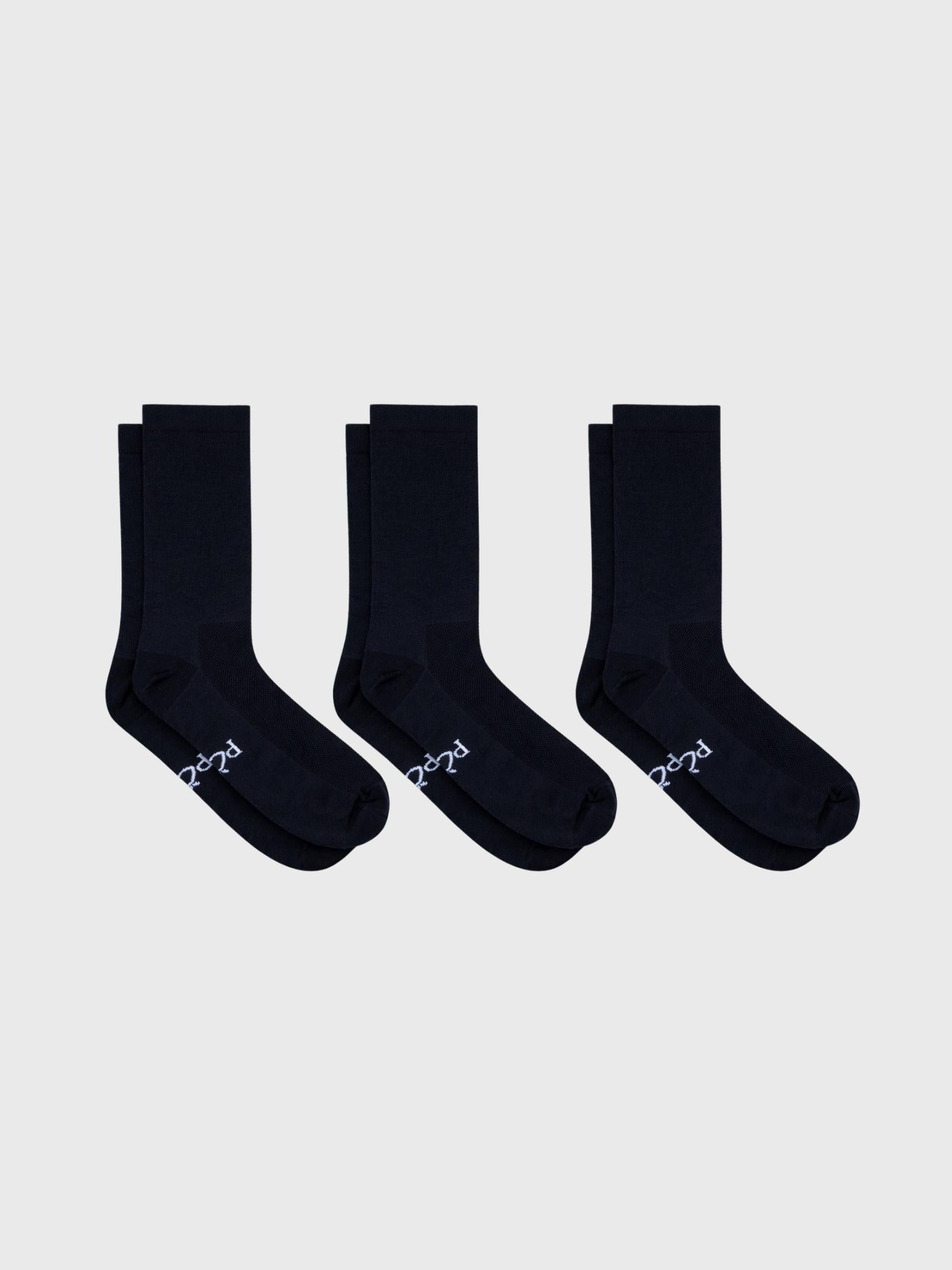 3-pack bundle of POP Cycling Co. plain black socks arranged in a row. High compression cycling socks with Fade Resistant deep black fabric.