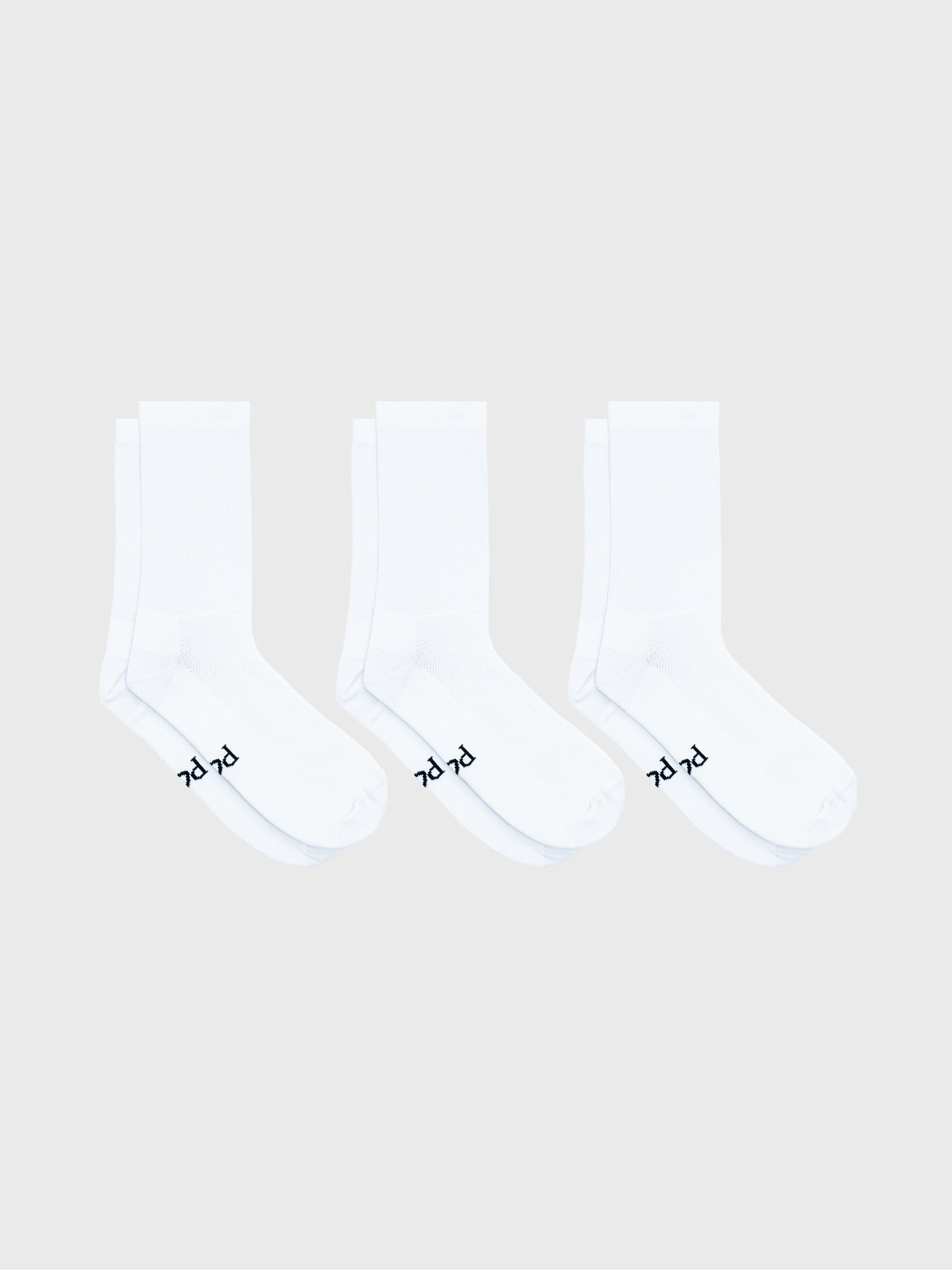 3-pack bundle of POP Cycling Co. Permanent White socks. High compression cycling socks with Colour Lock stain resistance.
