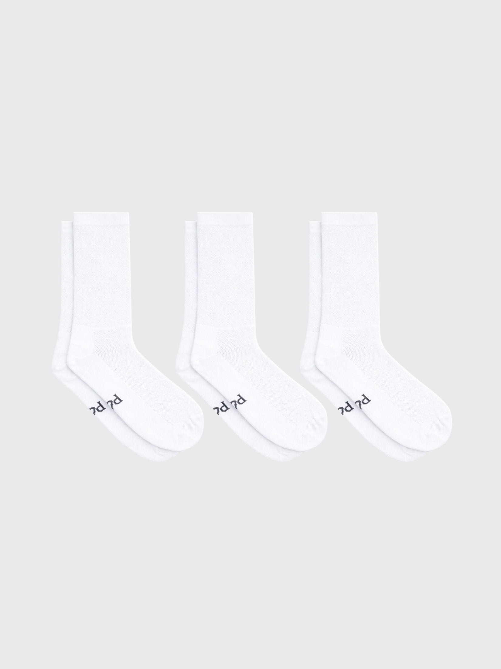 3-pack bundle of POP Cycling Co. Permanent White socks. High compression cycling socks with Colour Lock stain resistance.