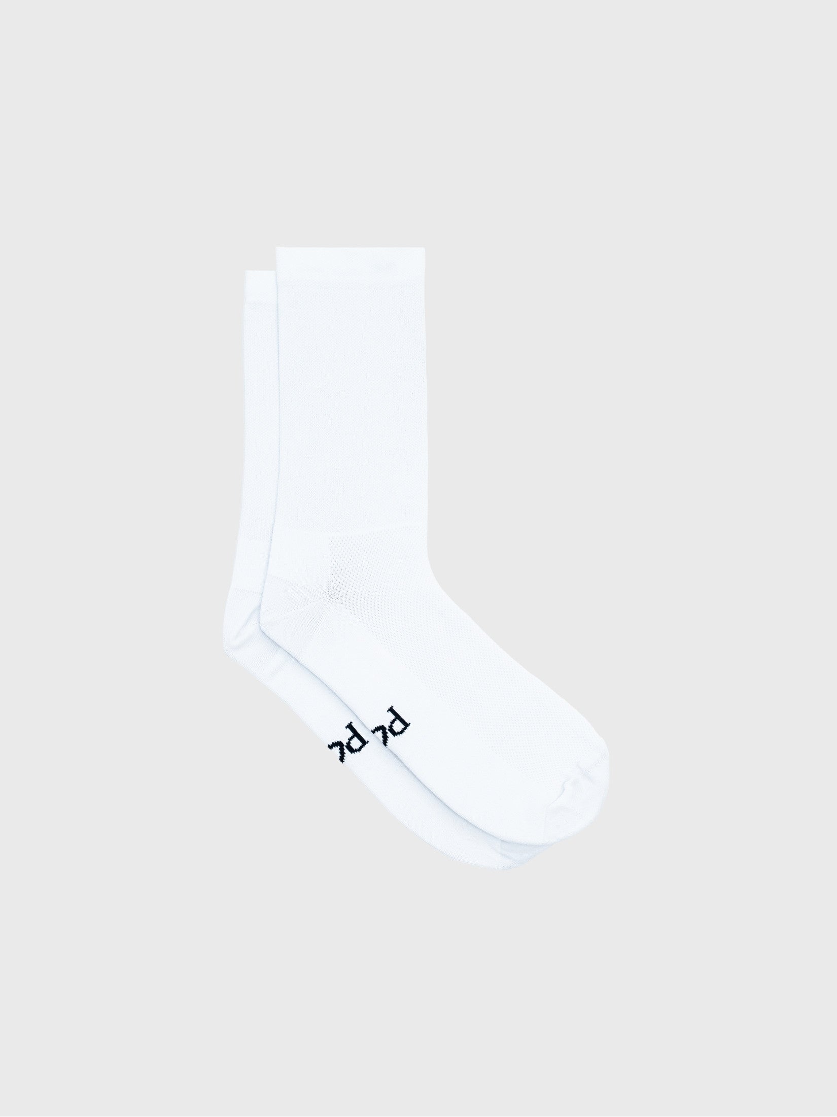 Plain white cycling socks with no logos. Minimalist unbranded design with high compression fit and 18cm cuff for a clean pro look.