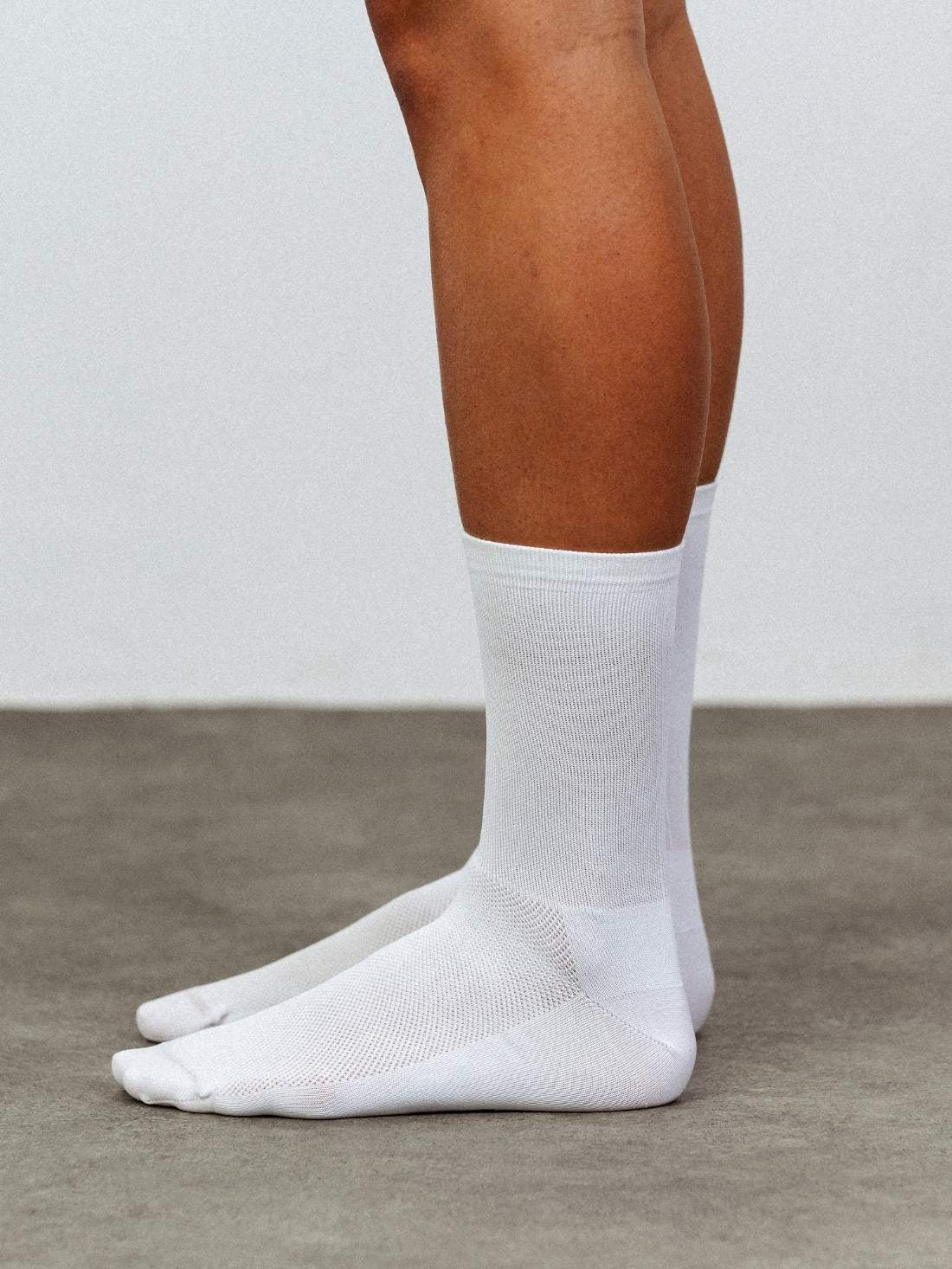 Side profile of white cycling sock